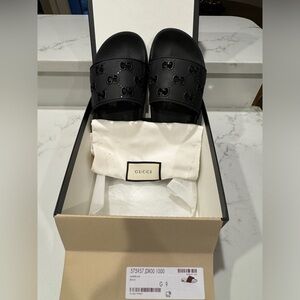 Men’s authentic Gucci slides size 9